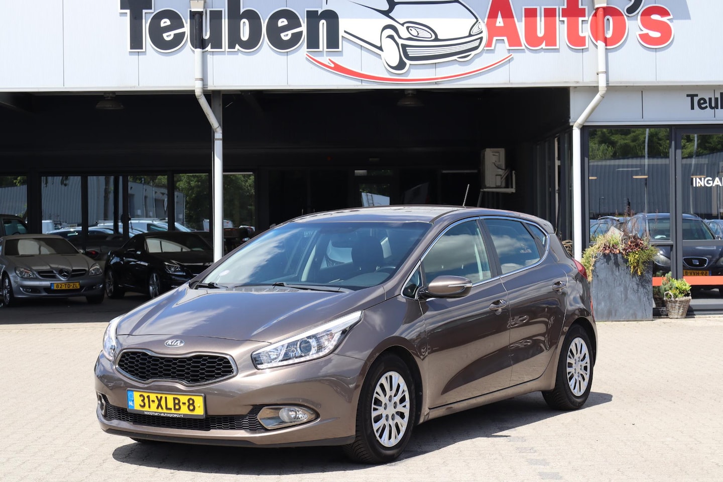 Kia Cee'd - 1.6 GDI Plus Pack Camera, Navigatie, Climate control, Elektrische ramen - AutoWereld.nl