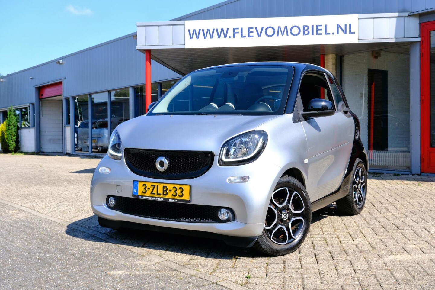Smart Fortwo - 1.0 Prime Pano|Leder|Navi|LMV - AutoWereld.nl
