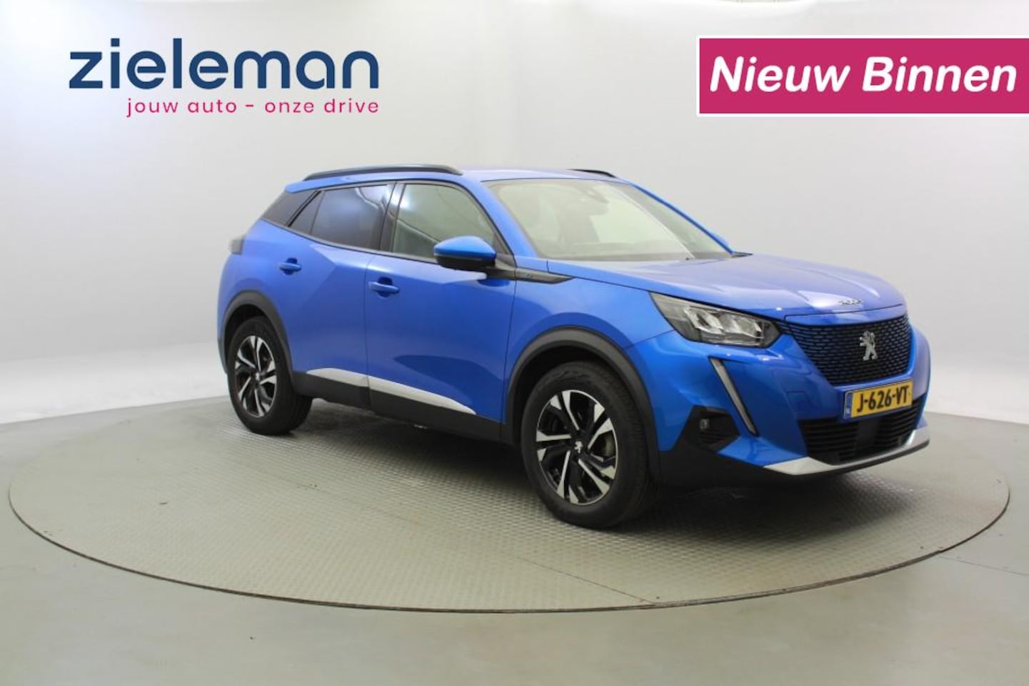 Peugeot 2008 - e-2008 Allure 50 kWh - Digital Cockpit, Carplay, Half Leer, Camera - AutoWereld.nl