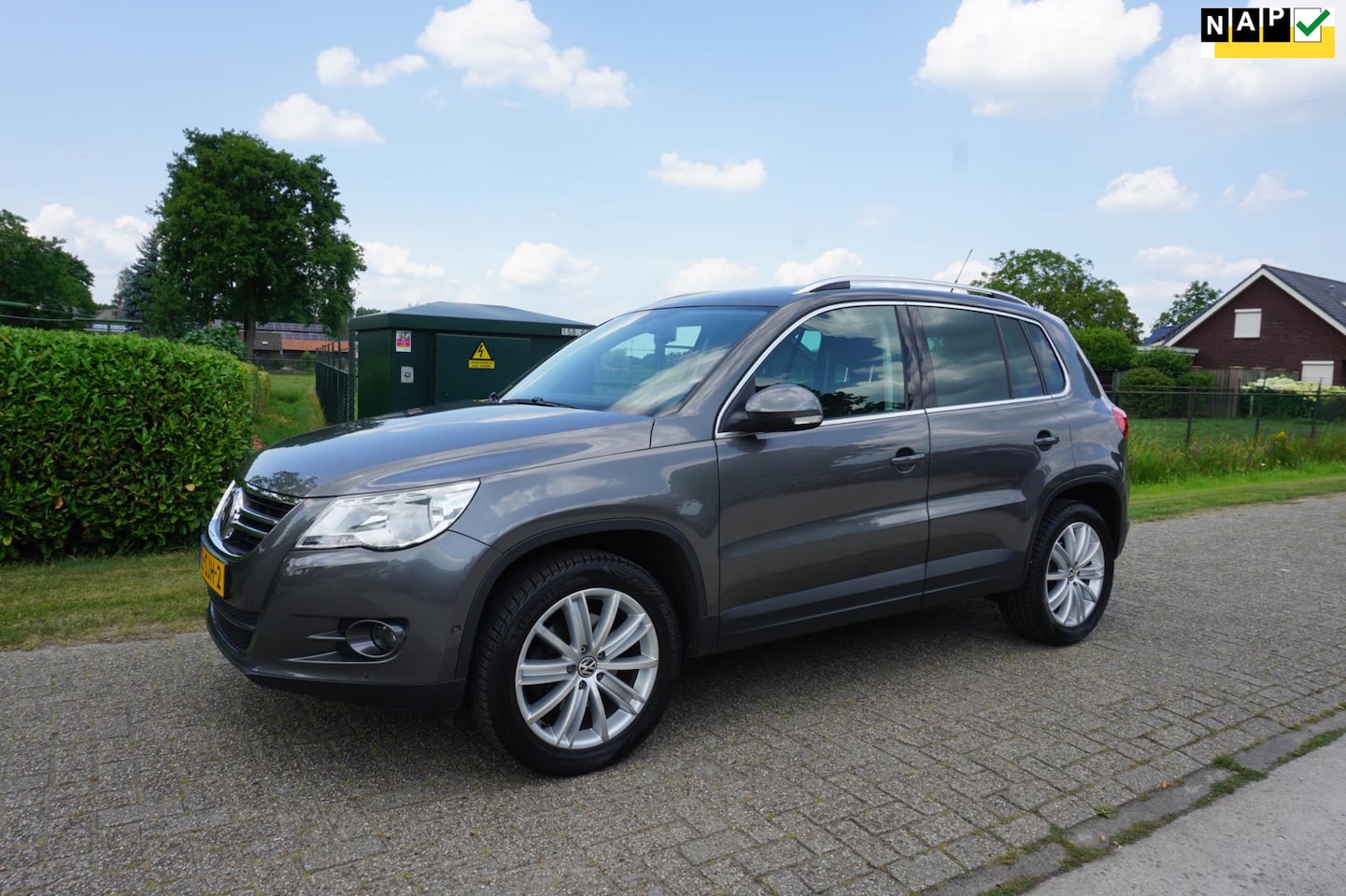 Volkswagen Tiguan - 1.4 TSI Sport&Style NAP - AutoWereld.nl