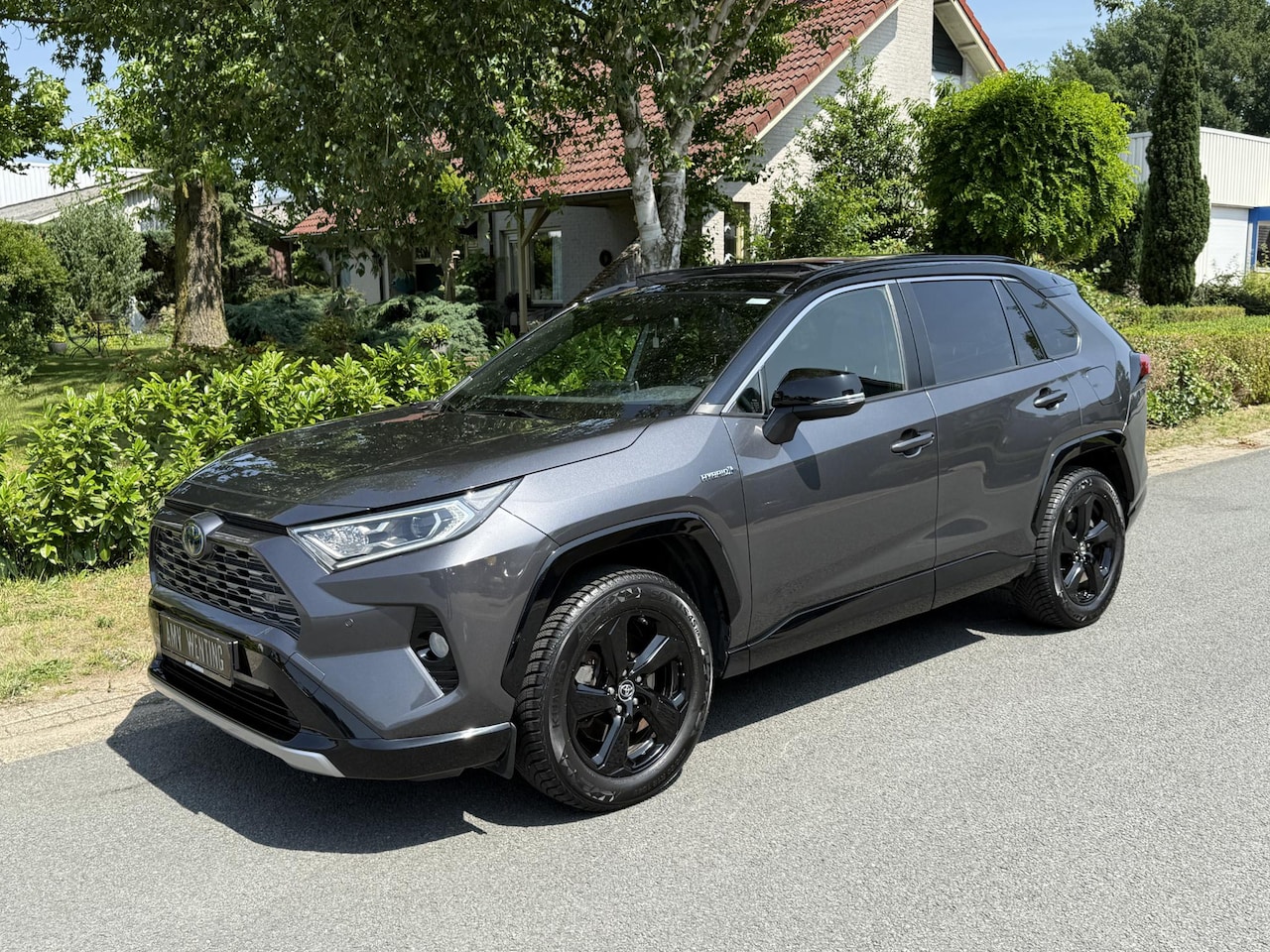 Toyota RAV4 - 2.5 VVT-i Hybrid Bi-Tone 218PK Pano•Trekhaak - AutoWereld.nl