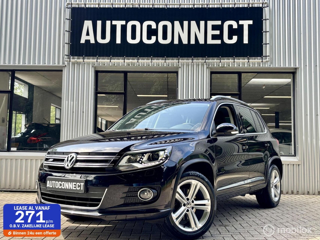 Volkswagen Tiguan - 1.4 TSI R-Line. NAVI, CRUISE, PDC. - AutoWereld.nl