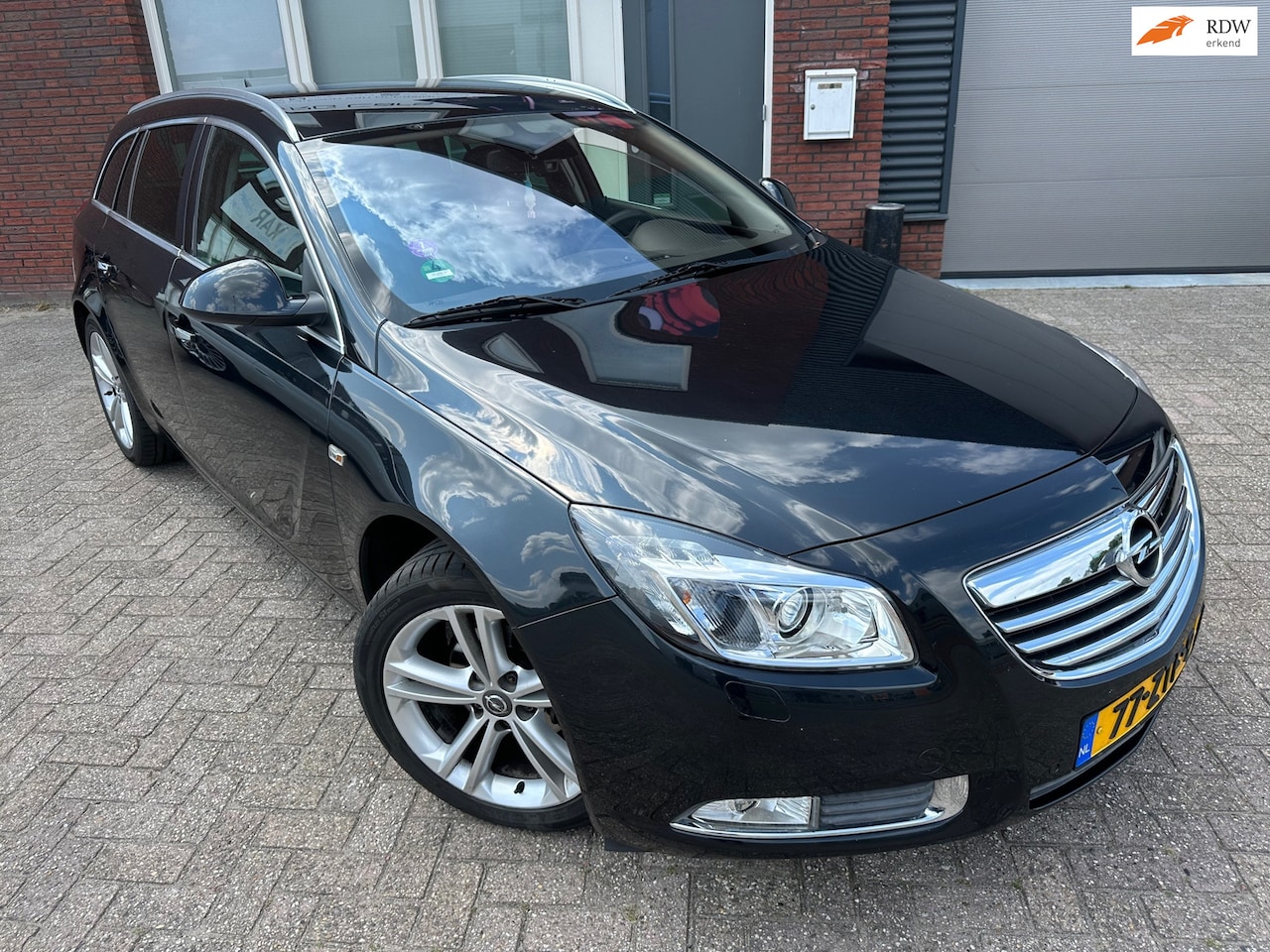 Opel Insignia Sports Tourer - 1.4 Turbo EcoFLEX Cosmo / Navi / Xenon / PDC / Stoelverwarming - AutoWereld.nl