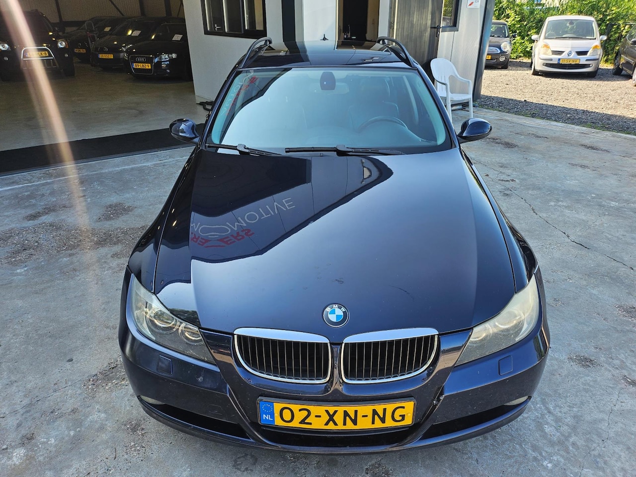 BMW 3-serie Touring - 320i High Executive AUT DAK LEER - AutoWereld.nl