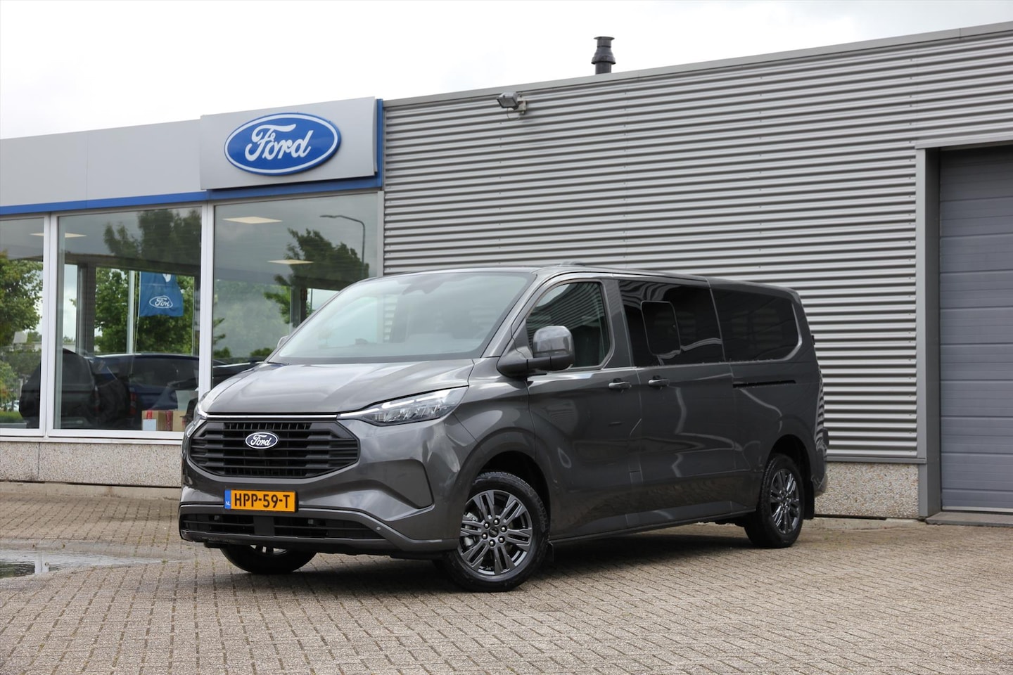 Ford Transit Custom - Kombi 2.5 PHEV 233pk L2H1 340 CVT Limited - AutoWereld.nl