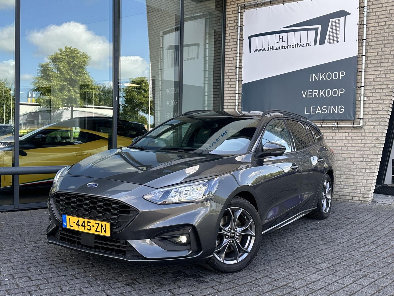 Ford Focus Wagon - 1.0 EcoBoost Hybrid ST Line*ECC*CRUISE*NAVI*CAM* - AutoWereld.nl