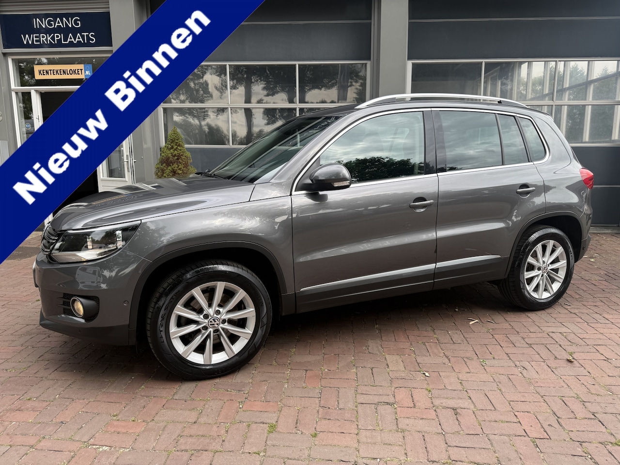 Volkswagen Tiguan - 1.4 TSI Sport&Style 03-2012 90.042 KM - AutoWereld.nl
