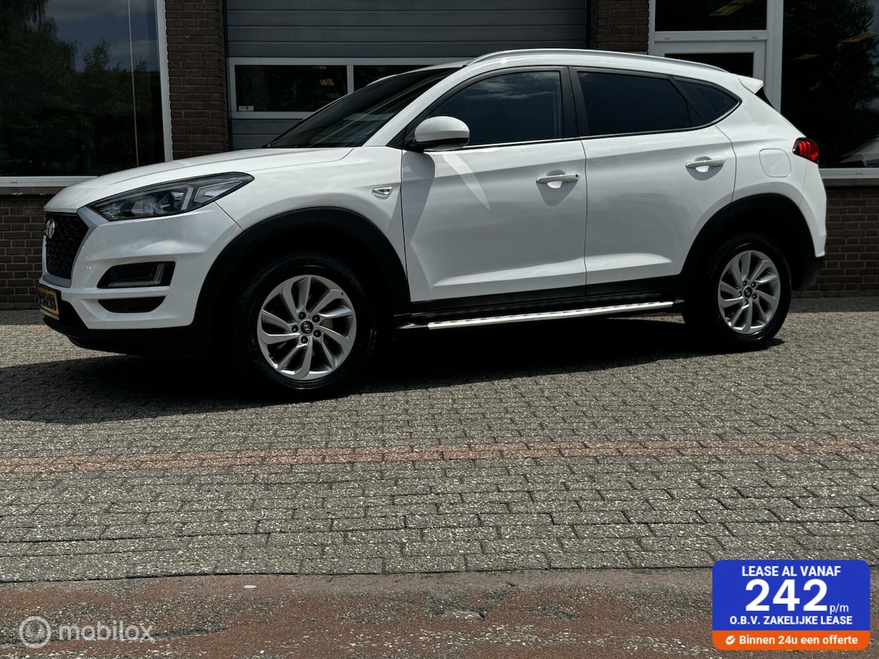 Hyundai Tucson - 1.6 GDI i-Drive ECC-AIRCO/NAVI/CRUISE/PDC - AutoWereld.nl