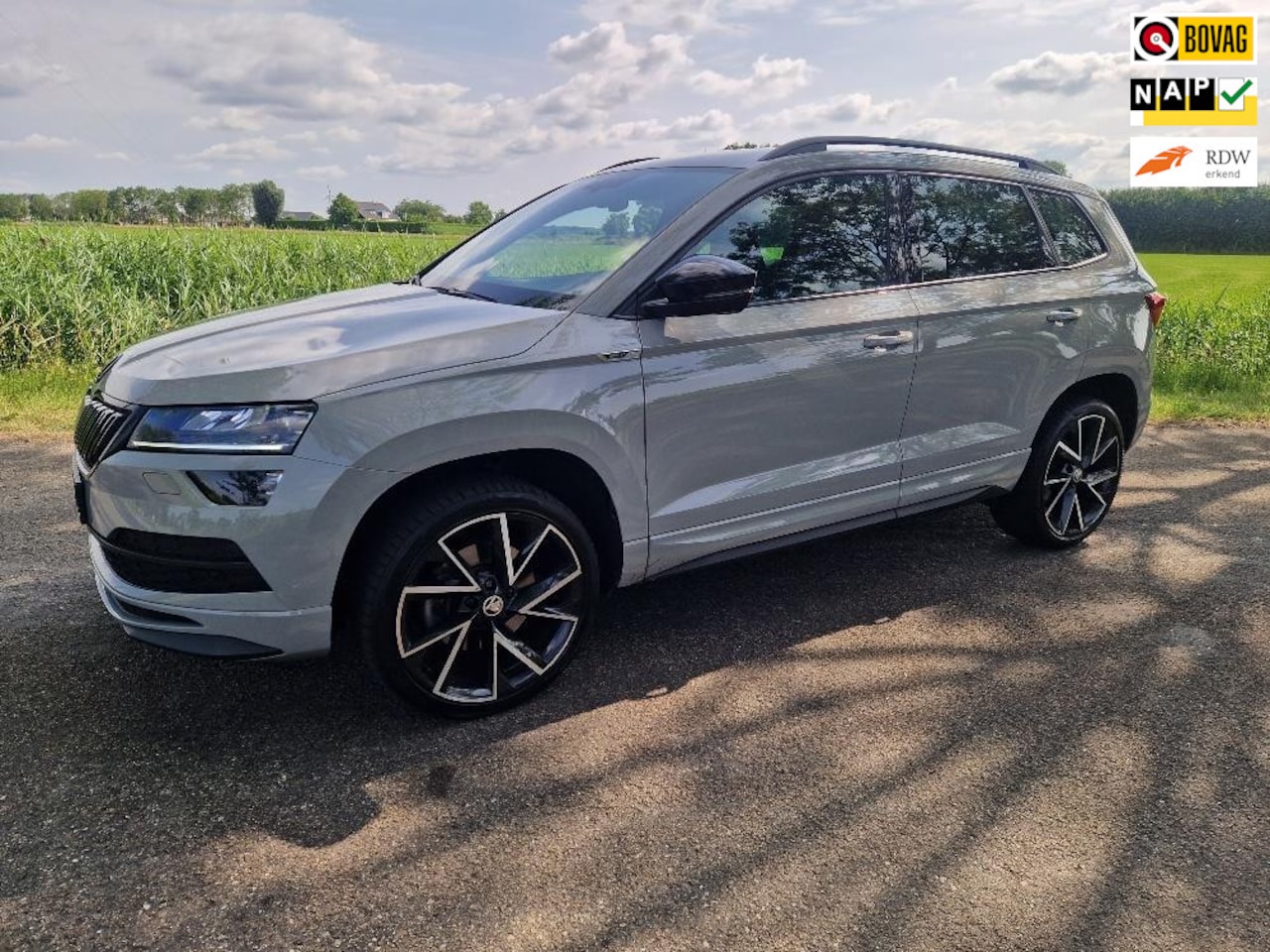 Skoda Karoq - 1.5 TSI ACT Sportline Business 1.5 TSI ACT Sportline Business, dealer onderhouden. - AutoWereld.nl