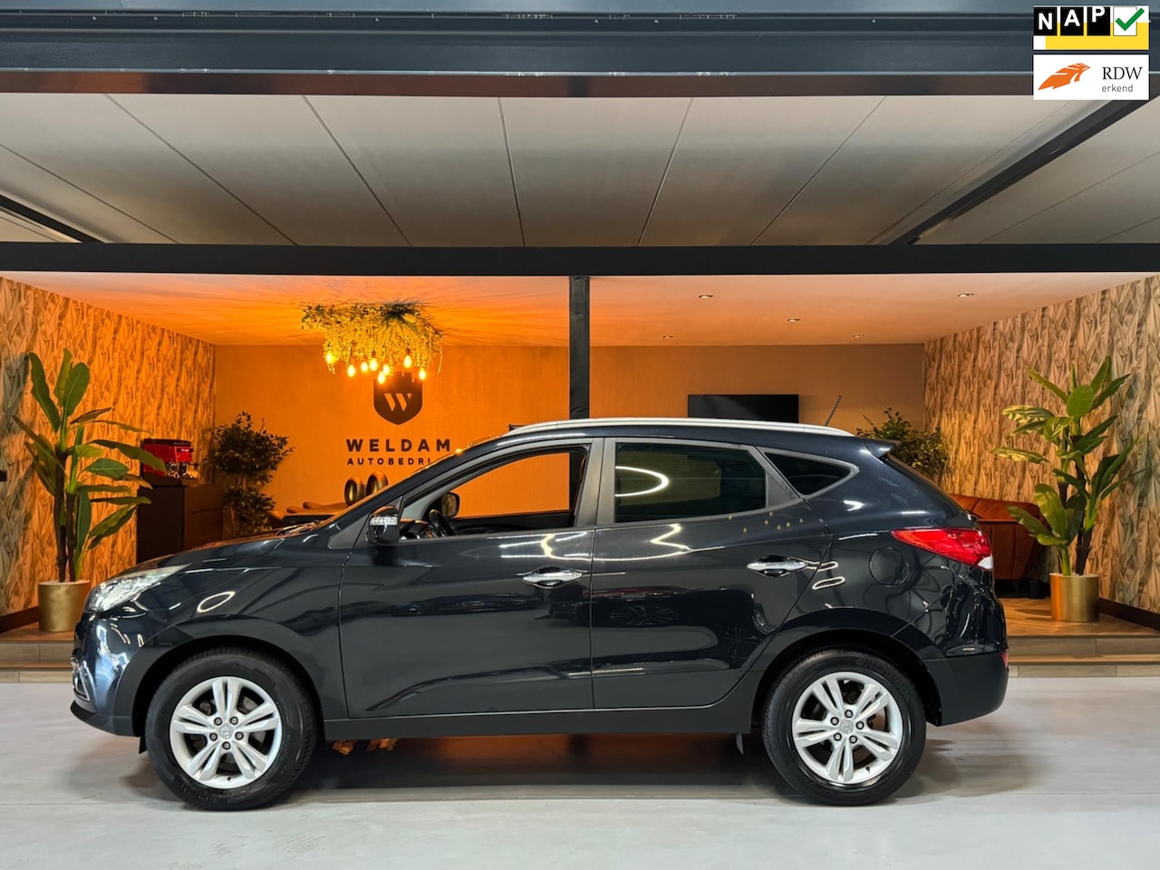 Hyundai ix35 - 2.0i Style NAP Trekhaak Pano Camera Cruise Navi Clima Rijklaar - AutoWereld.nl