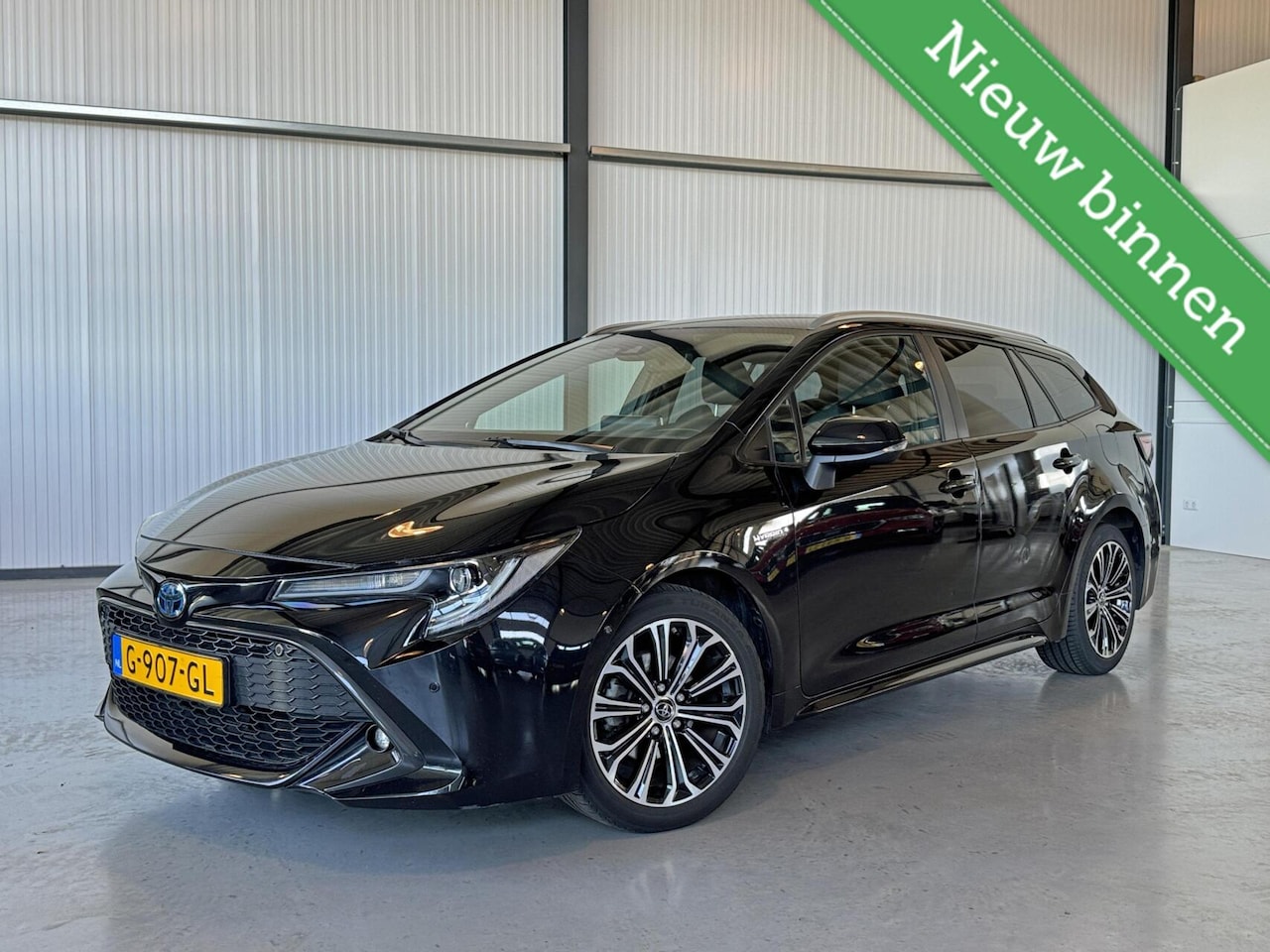 Toyota Corolla Touring Sports - 1.8 Hybrid Style|Camera|Navi|Adapt.Cruise|HuD| - AutoWereld.nl
