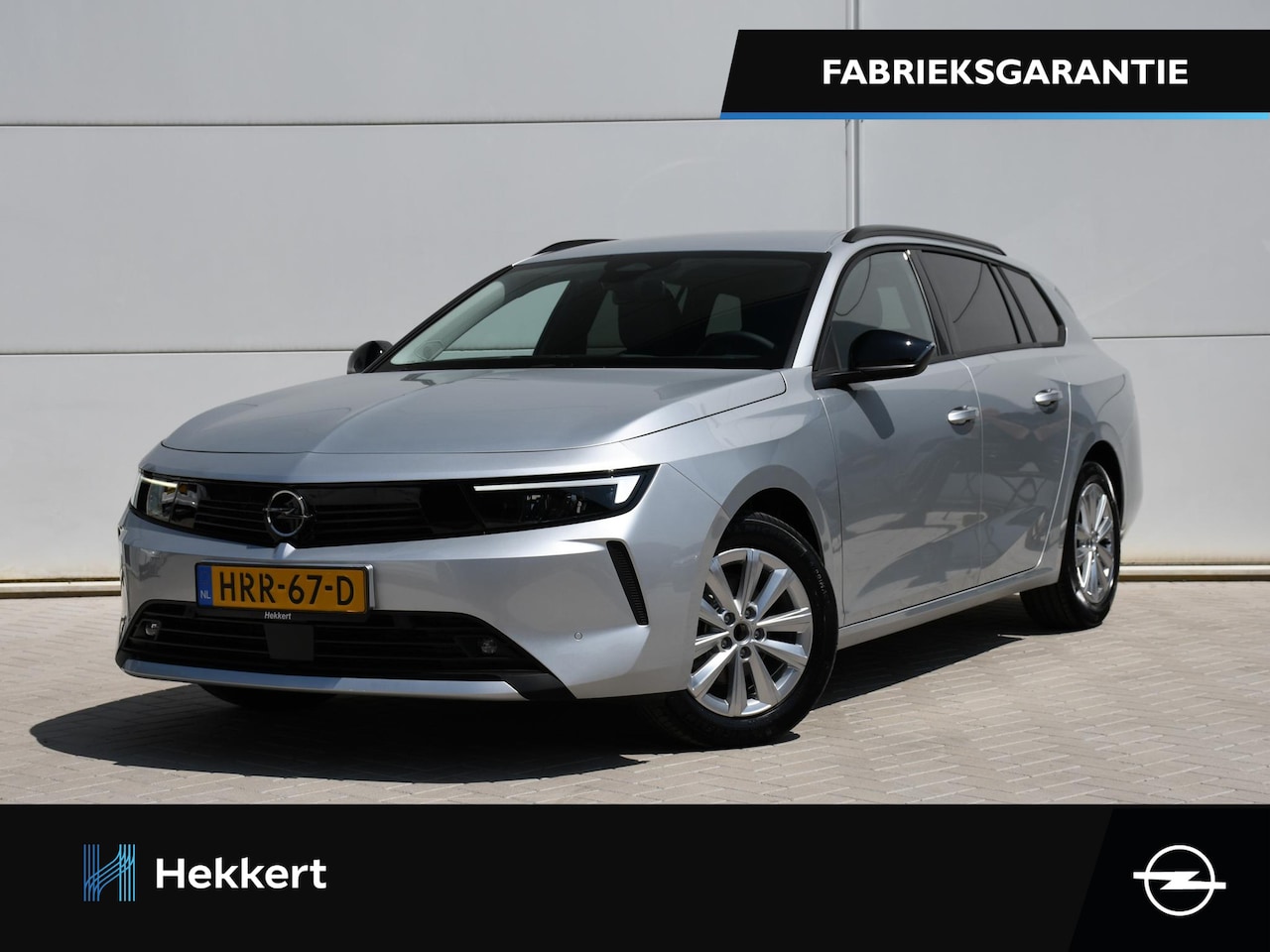 Opel Astra Sports Tourer - Business Edition 1.2 Turbo 110pk PDC + CAM. | 16''LM | ADAPT. CRUISE | NAVI | DAB | APPLE- - AutoWereld.nl