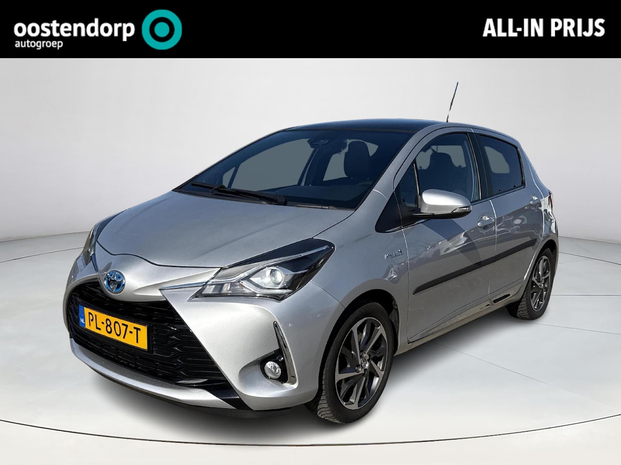Toyota Yaris - 1.5 Hybrid Premium **NAVIGATIE/ TREKHAAK/ PANORAMADAK/ KEYLESS/ GARANTIE** - AutoWereld.nl