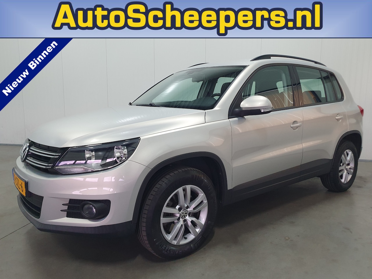 Volkswagen Tiguan - 1.4 TSI Comfort&Design AIRCO/TRHAAK/CRUISE/LMV - AutoWereld.nl