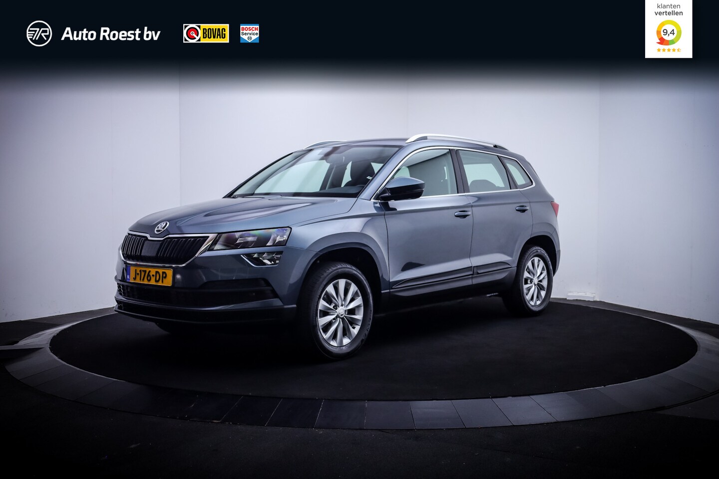 Skoda Karoq - 1.0 TSI Ambition Business CAMERA | CARPLAY | DAB | NAVI | STOELVERW | TREKHAAK | CLIMA | C - AutoWereld.nl
