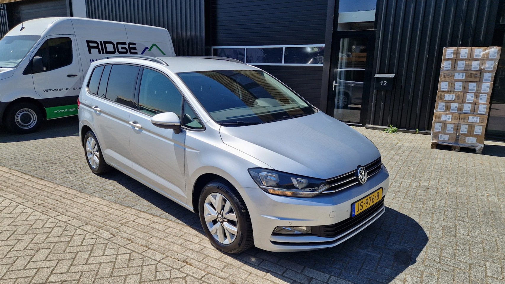 Volkswagen Touran - 1.2 TSI Comfortline Airco/Navi - AutoWereld.nl