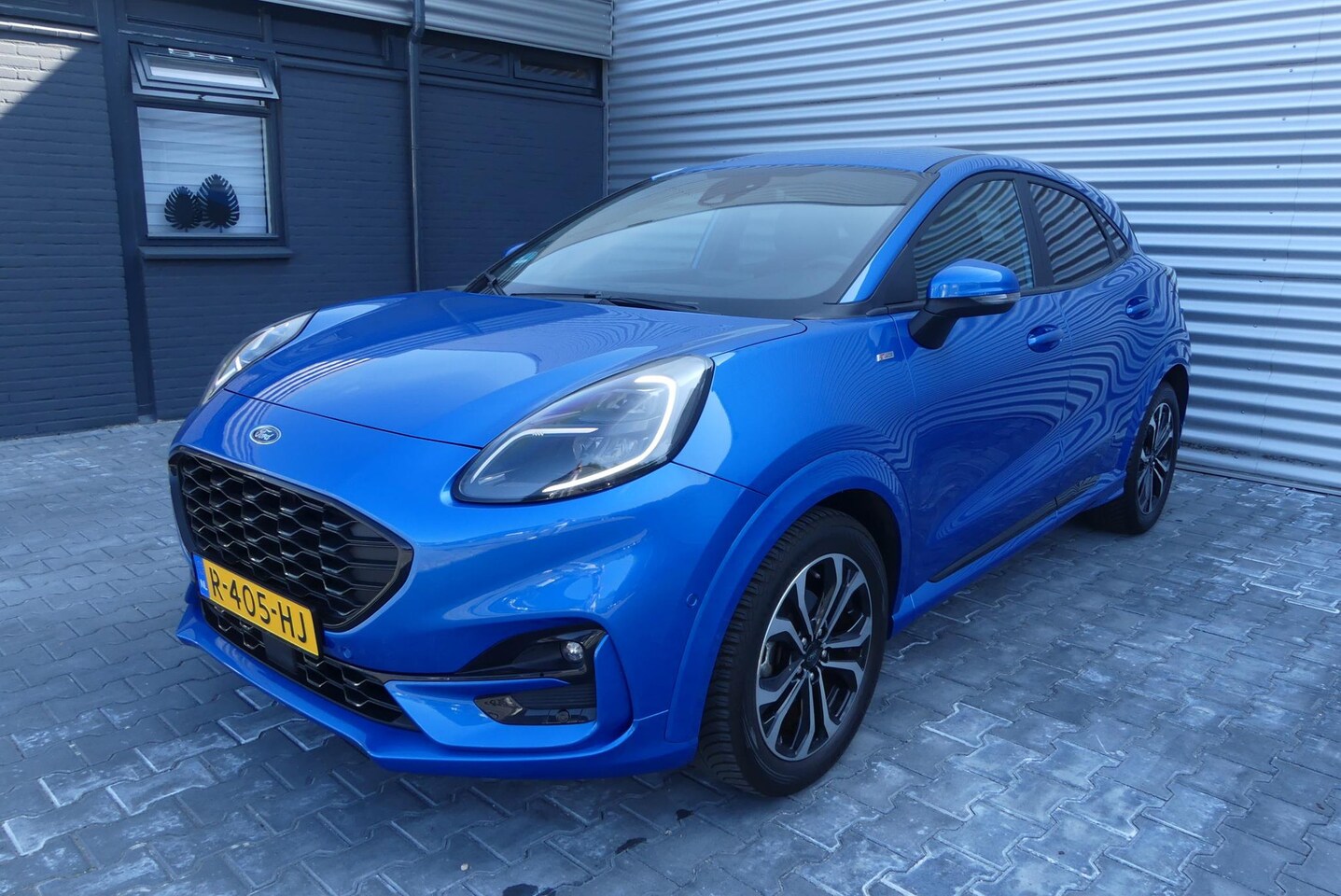 Ford Puma - 1.0 EcoBoost Hybrid ST-Line X ADAPTIEVE CRUISE, CLIMA, NAVI, CAMERA, WINTER PACK, TREKHAAK - AutoWereld.nl