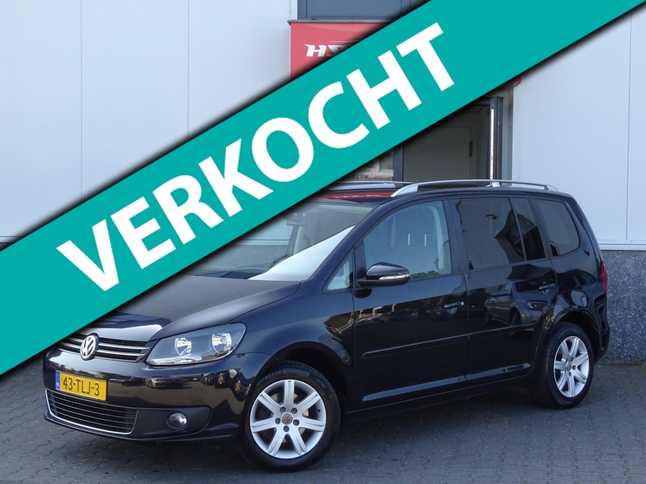 Volkswagen Touran - 1.4 TSI Comfortline 7p navi automaat LM - AutoWereld.nl