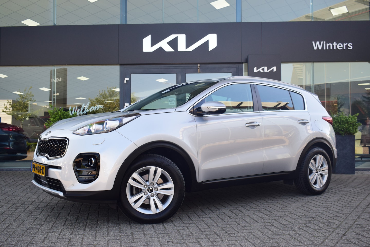 Kia Sportage - 1.6 GDI ExecutiveLine | Trekhaak | JBL | Navigatie | Keyless | Ledere bekleding | Tot 10jr - AutoWereld.nl