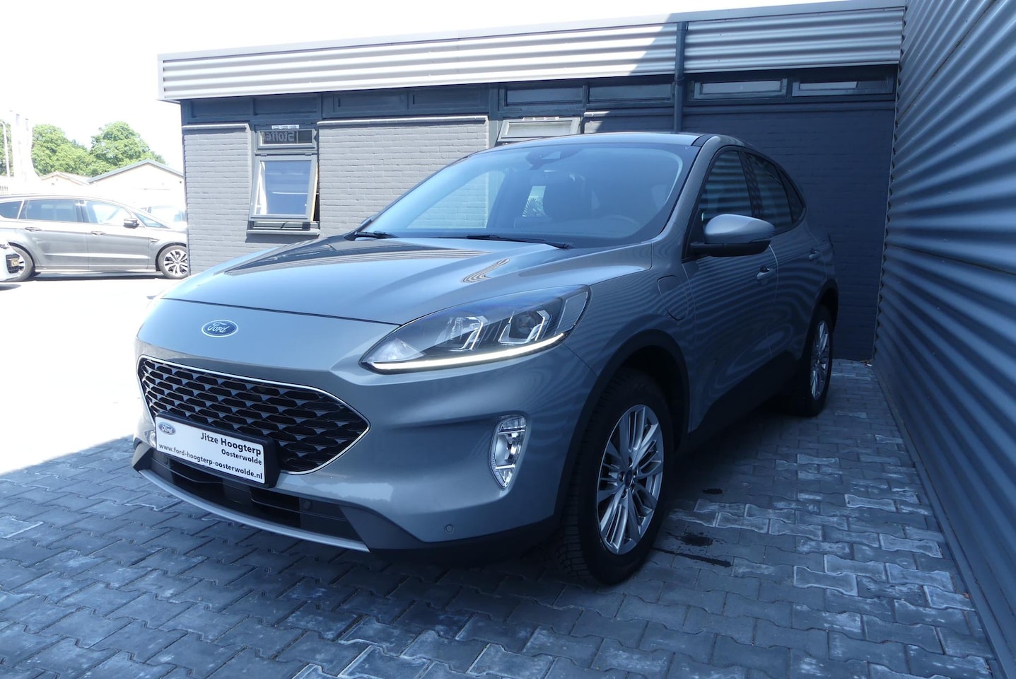 Ford Kuga - 2.5 PHEV Titanium CRUISE, CLIMA, NAVI, WINTER PACK, PDC V&A, 83.429KM - AutoWereld.nl
