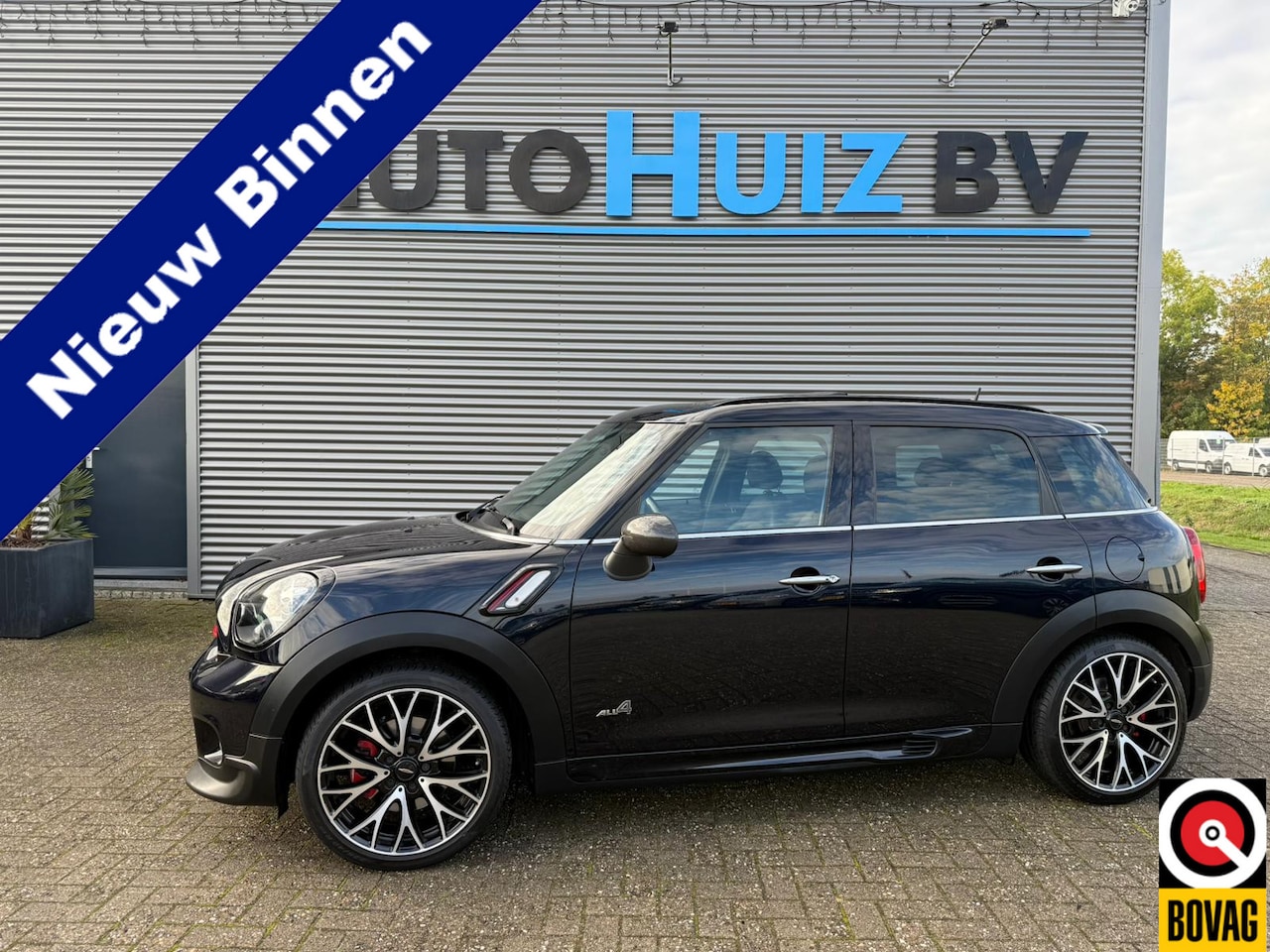 MINI Countryman - Mini 1.6 John Cooper Works ALL4 Chili Panoramadak Harman-Kardon Leer 19 Inch Keyless Entry - AutoWereld.nl
