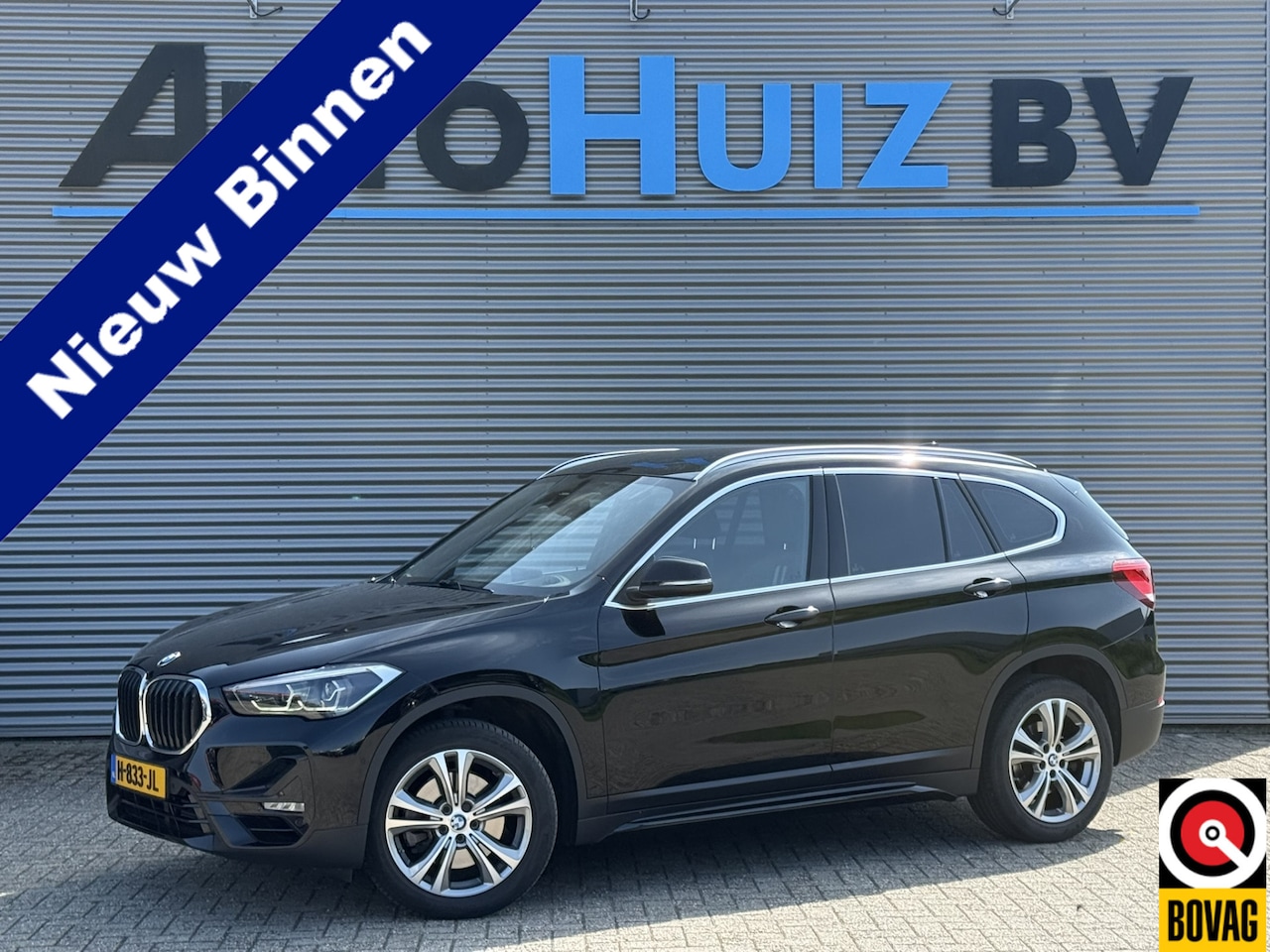 BMW X1 - sDrive20i 192 PK Sport Line Achteruitrijcamera Trekhaak DAB Head-Up Display 18 Inch - AutoWereld.nl