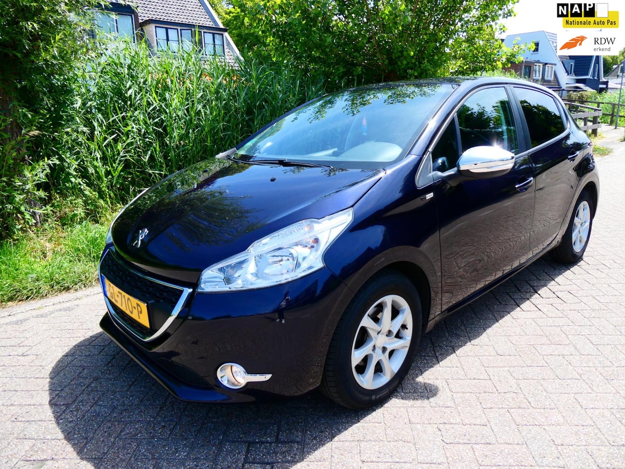 Peugeot 208 - 1.2i Style 5-deurs Airco Cruise Navi 96.000km Zuinig A-Label - AutoWereld.nl