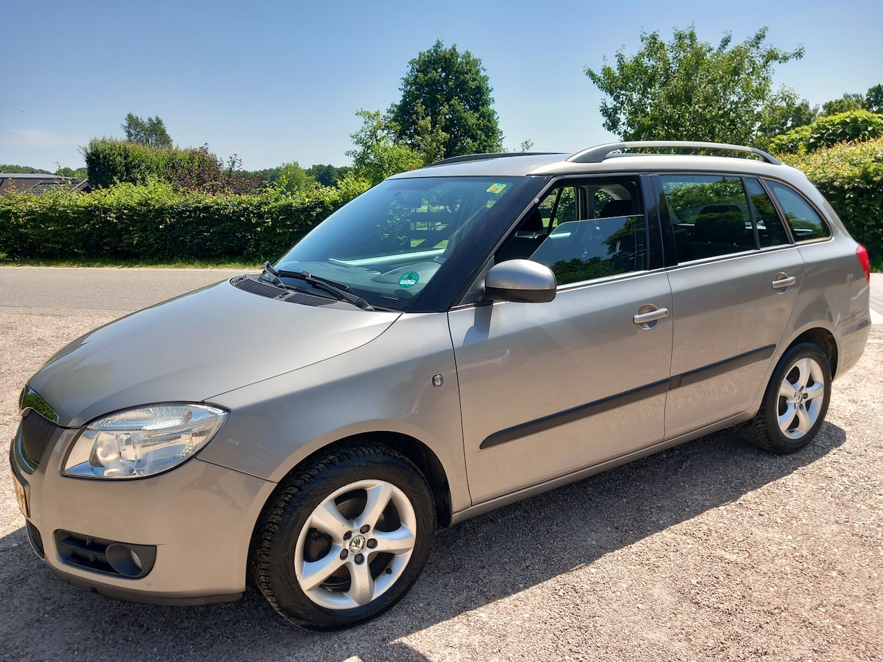 Skoda Fabia Combi - 1.6-16V Elegance Climat/Cruise Control! - AutoWereld.nl
