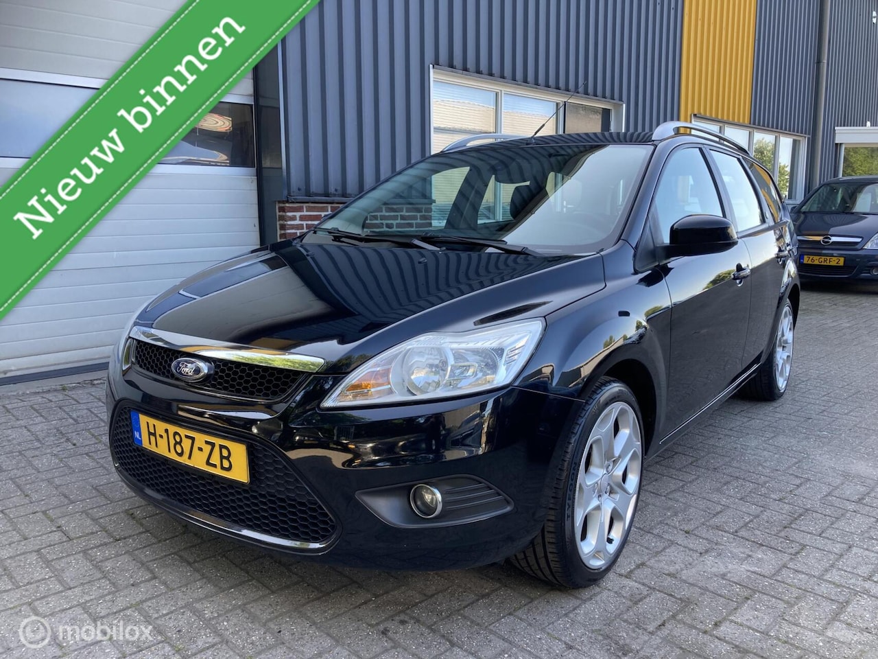 Ford Focus Wagon - 1.8 Limited Flexi Fuel TREKHAAK! - AutoWereld.nl