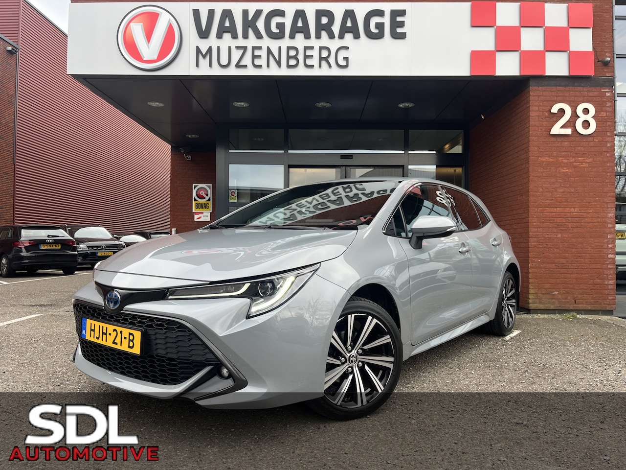 Toyota Corolla - 1.8 Hybrid Dynamic // FULL LED // HALF LEDER // ADAPT. CRUISE // KEYLESS // CAMERA // STOE - AutoWereld.nl