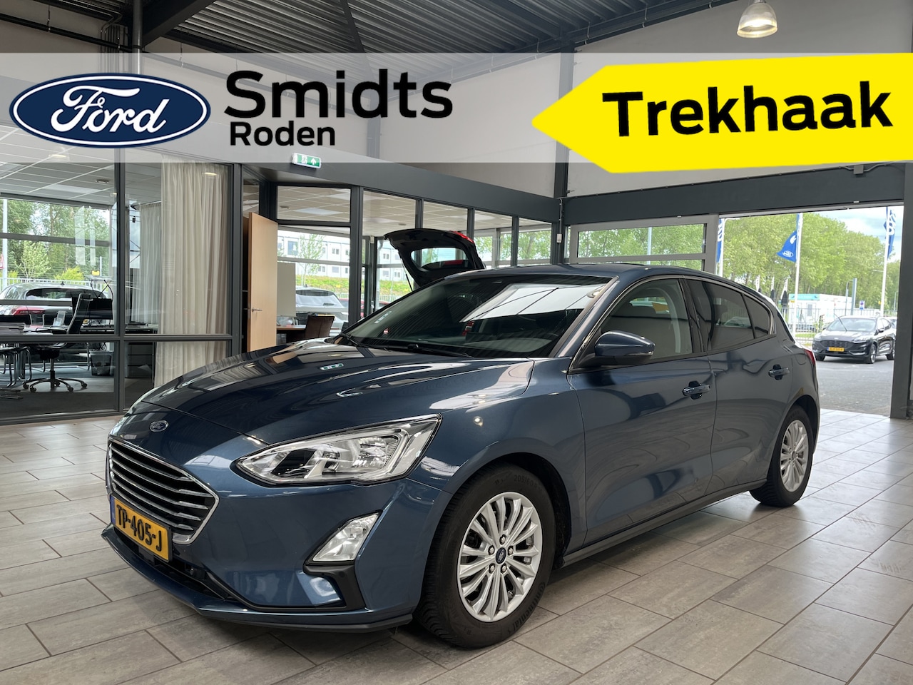 Ford Focus - EcoBoost 125PK Titanium Business | Trekhaak | Winter Pack | Keyless | Navi | Park. Sens. V - AutoWereld.nl