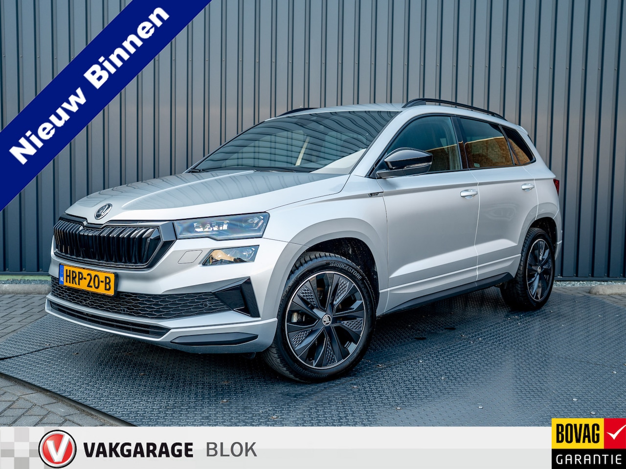 Skoda Karoq - 1.5 TSI ACT Sportline Business | Camera | Stoel & Stuur verw. | Adapt. Cruiscontrol | Prij - AutoWereld.nl