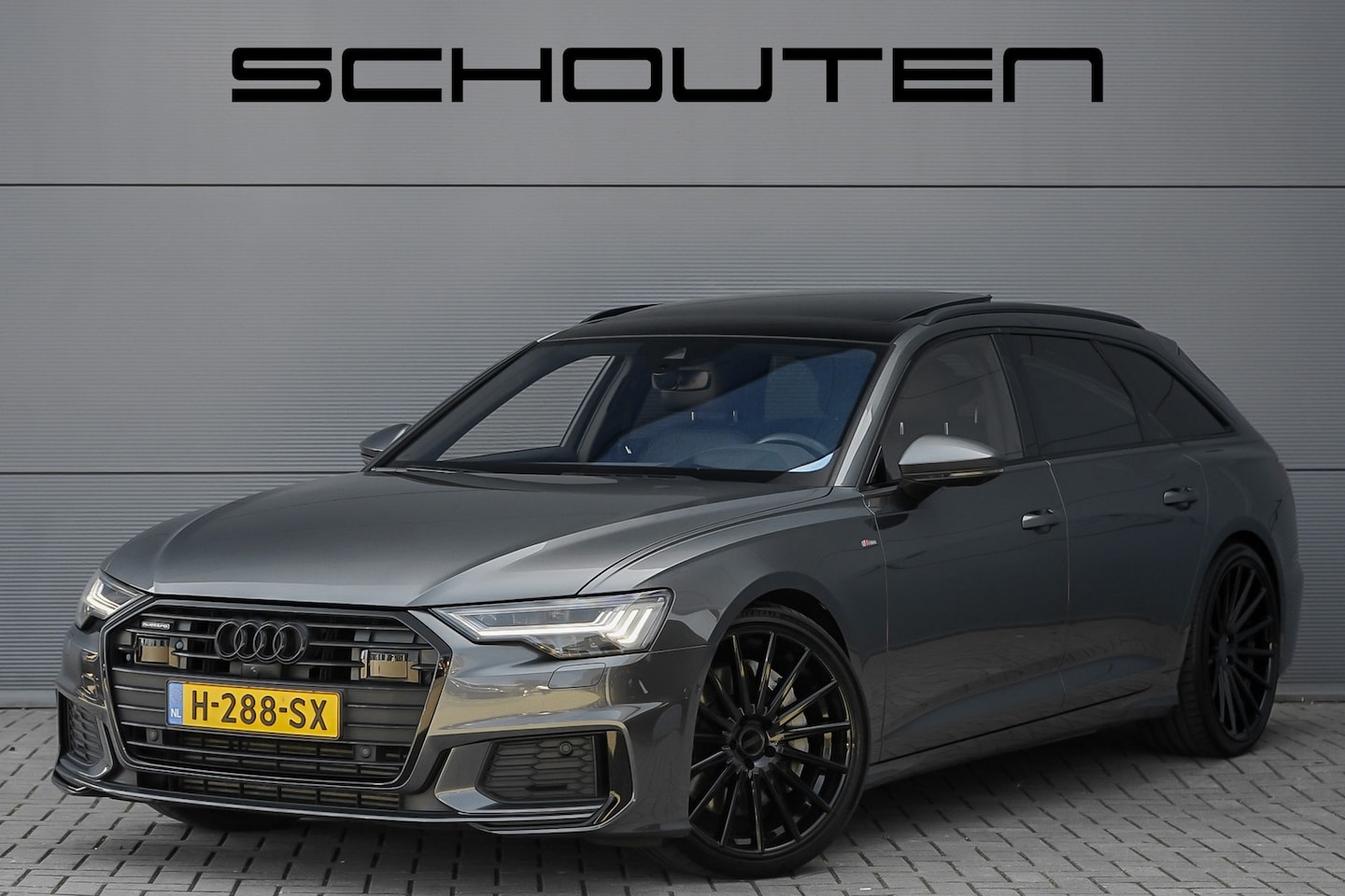 Audi A6 Avant - 55 TFSI Quattro Design S Pano Luchtvering 4WS Trekhaak 21" Vossen - AutoWereld.nl