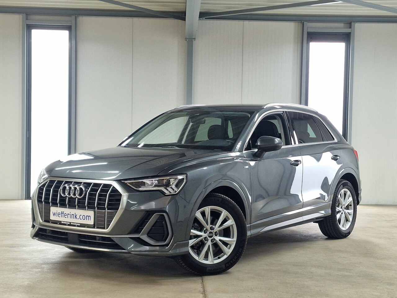Audi Q3 - 35 TFSI 150pk S-Tronic S-Line | Camera | Leder/alcantara, Cruise control - AutoWereld.nl