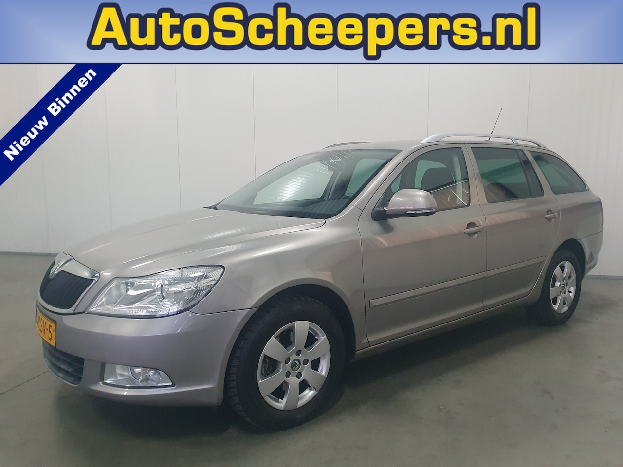 Skoda Octavia Combi - 1.4 TSI Elegance NAVI/TRHAAK/CLIMA/CRUISE - AutoWereld.nl