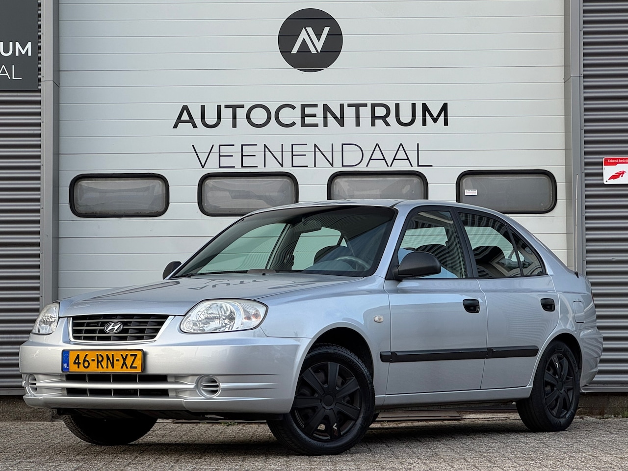 Hyundai Accent - 1.3i Active APK 03-2026 AIRCO/TREKHAAK/EL. RAMEN - AutoWereld.nl