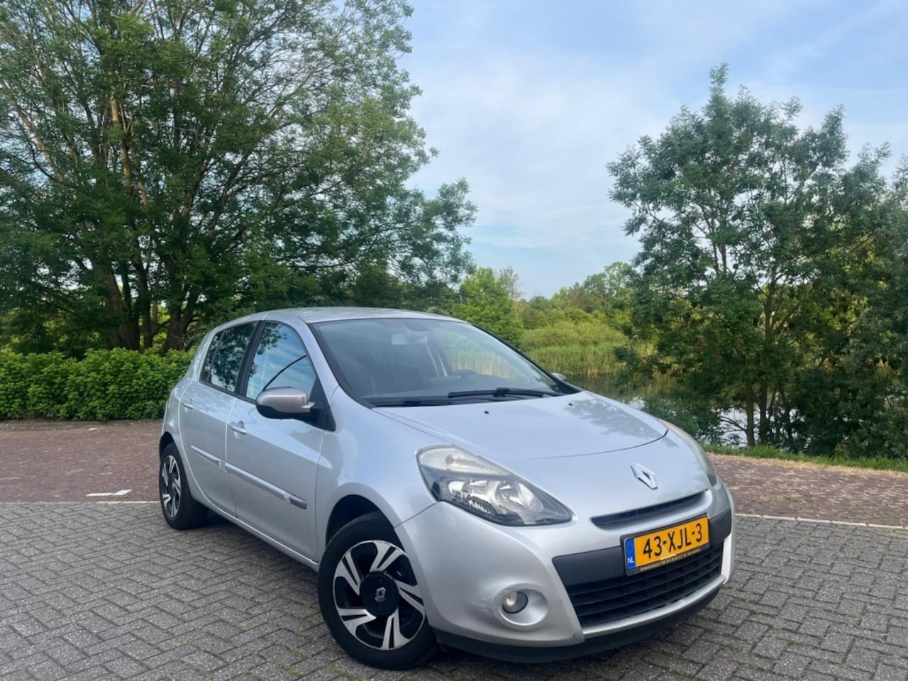 Renault Clio - 1.5 dCi Night & Day Navigatie|Clima - AutoWereld.nl