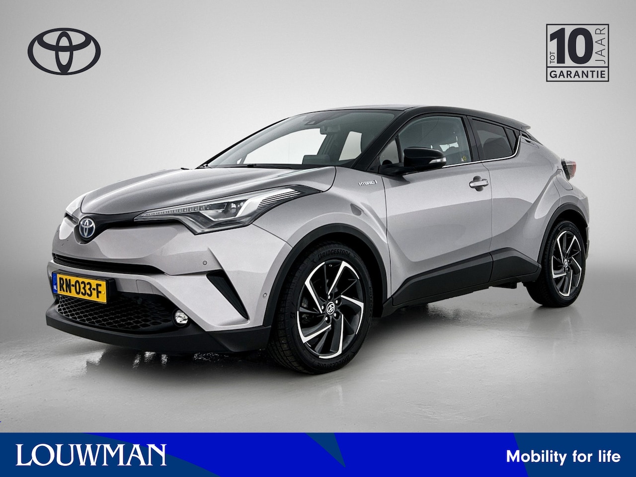 Toyota C-HR - 1.8 Hybrid Bi-Tone Plus | Navigatie | LED | Lederen Bekleding | Stuur- en Stoelverwarming - AutoWereld.nl