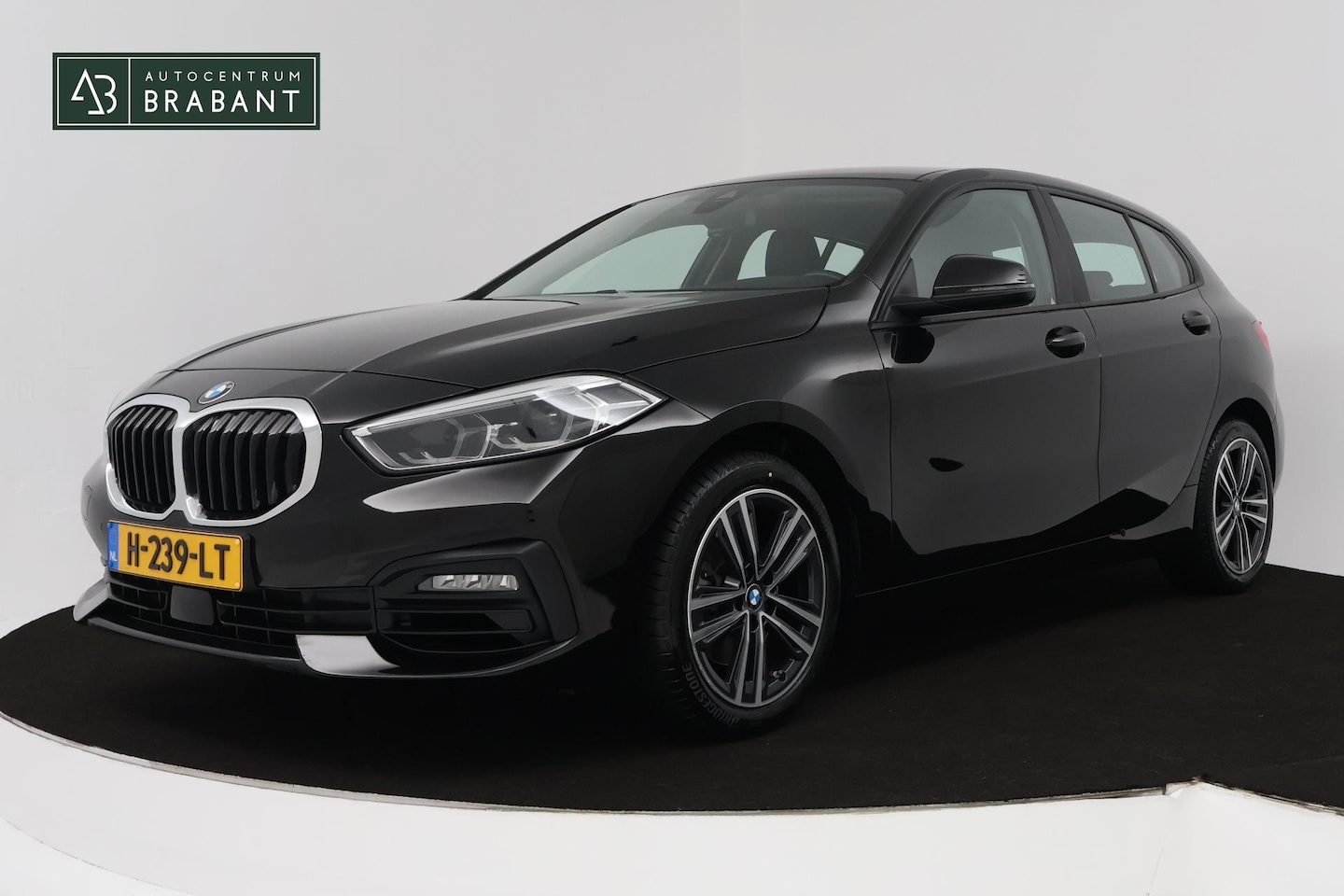BMW 1-serie - 118i High Executive Edition (PARKEERSENSOREN, STOELVERWARMING, CRUISE CONTROL, LEDEREN STO - AutoWereld.nl