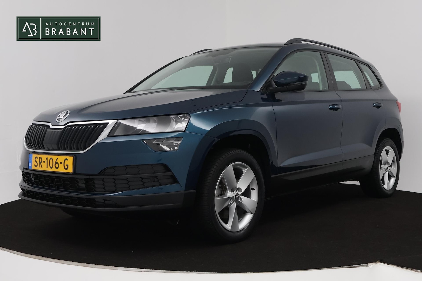 Skoda Karoq - 1.5 TSI ACT Ambition Business (ACHTERUITRIJCAMERA, PARKEERSENSOREN, CRUISE CONTROL, NAVIGA - AutoWereld.nl