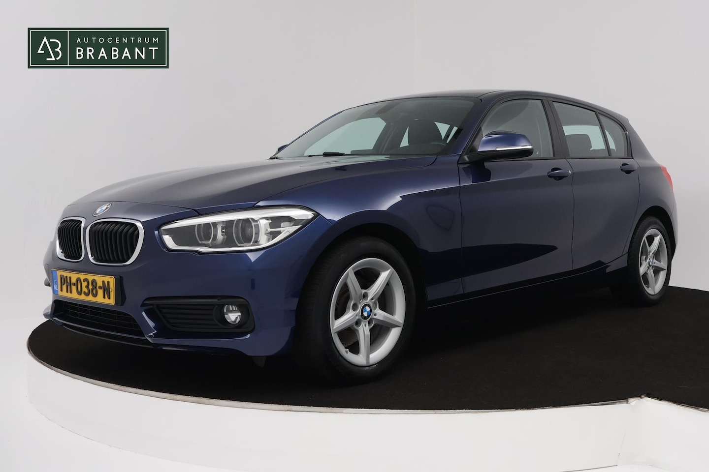 BMW 1-serie - 118i Corporate Lease Executive (PARKEERSENSOREN, NAVIGATIE, CRUISE CONTROL, AUTOMAAT, NL-A - AutoWereld.nl