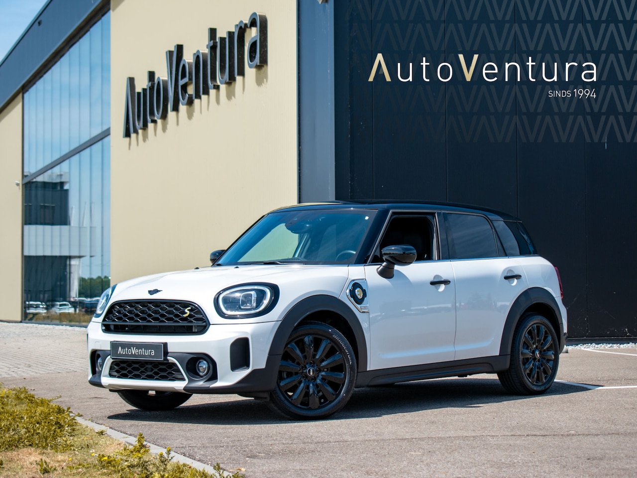 MINI Countryman - Mini 2.0 Cooper S E ALL4 Classic Leder l Camera l Cruise control l PDC l 18 Inch - AutoWereld.nl