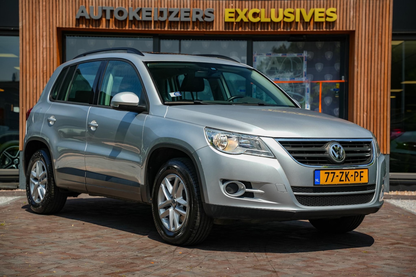 Volkswagen Tiguan - 1.4 TSI Comfort&Design 4Motion Panoramadak Clima Radio/CD Elektr. Ramen - AutoWereld.nl