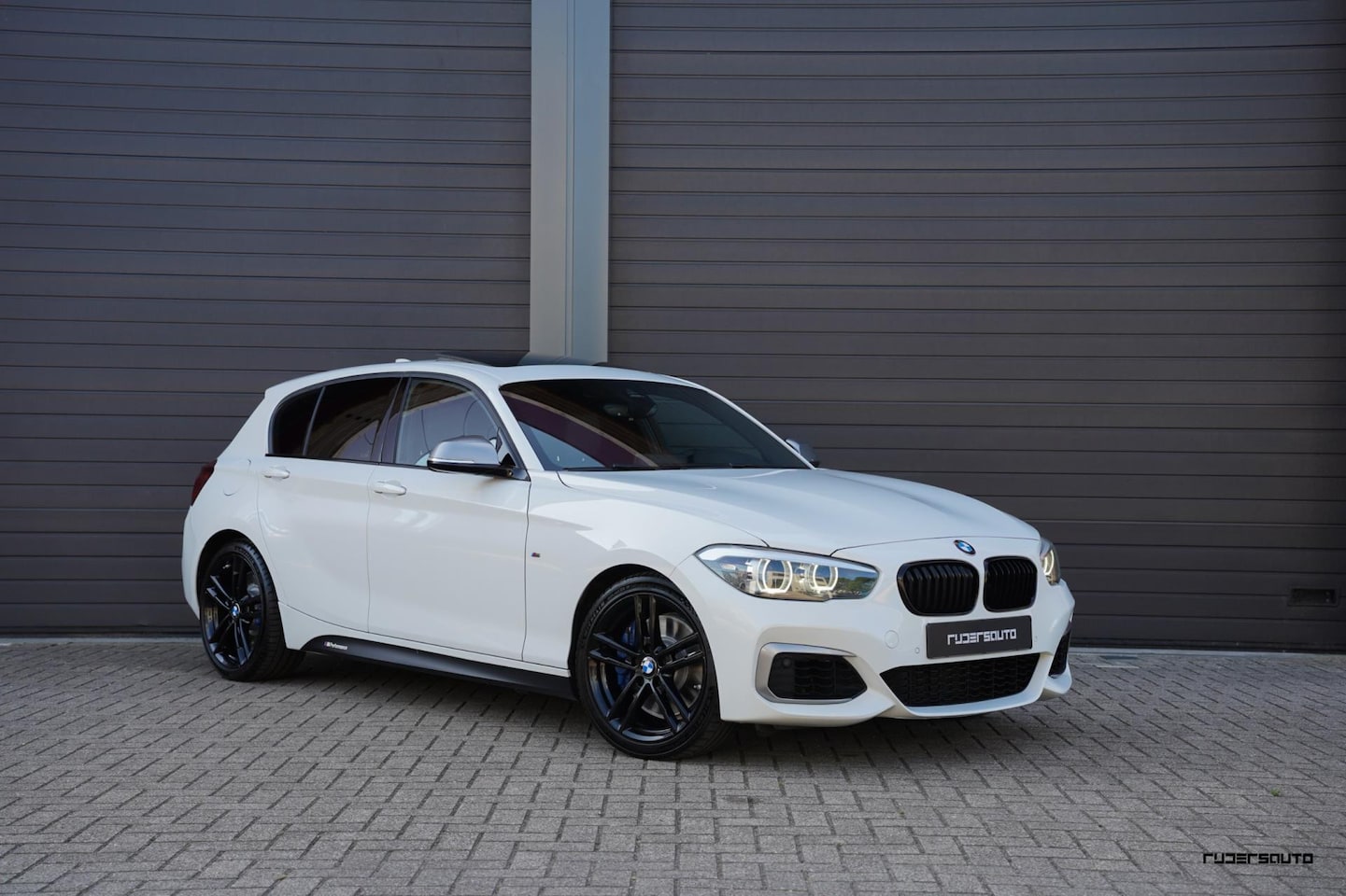 BMW 1-serie - M140i LCI2 | Schuifdak | Navi Pro | 719M | M Sport onderstel | Alpinweiss - AutoWereld.nl