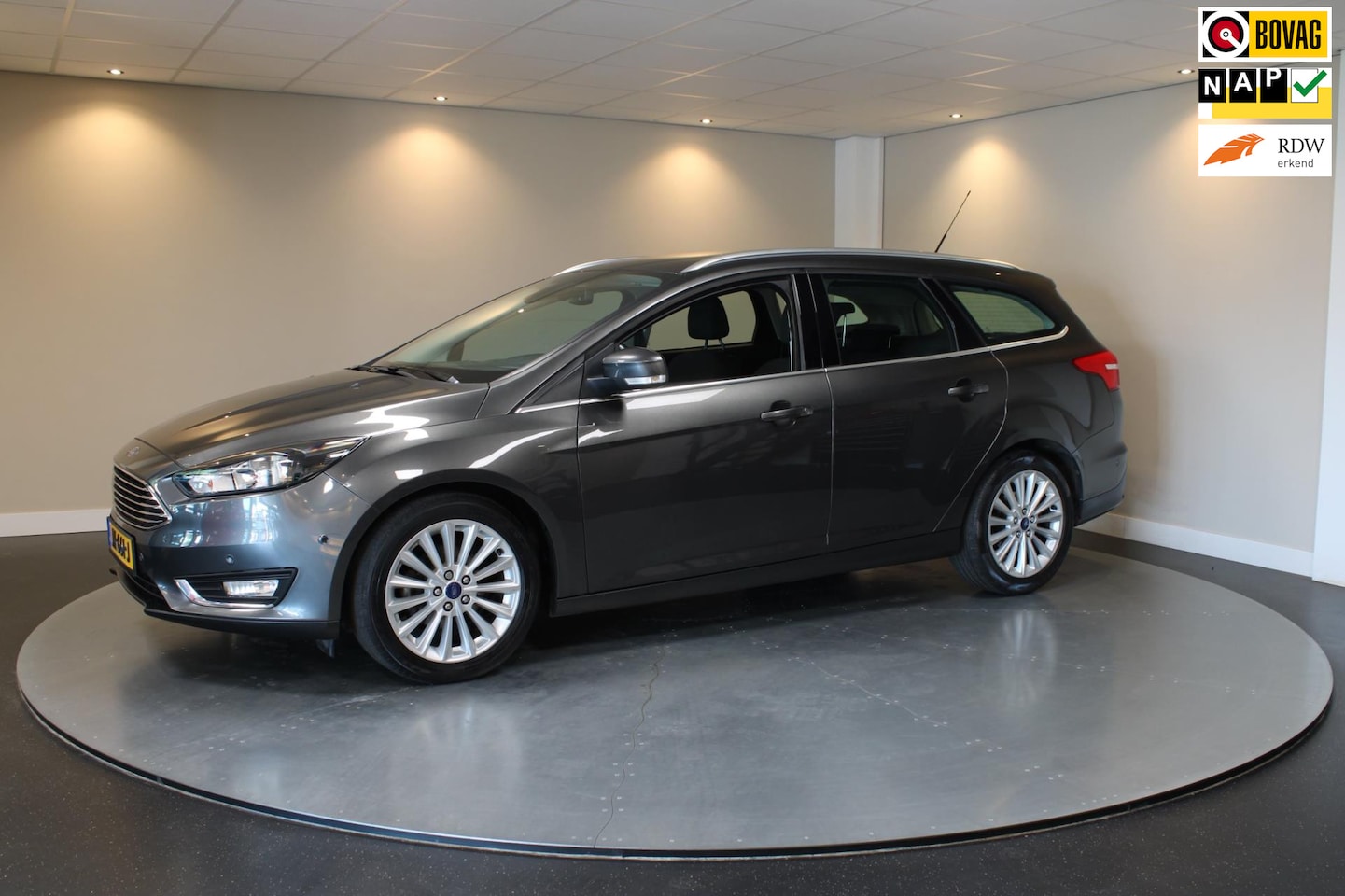 Ford Focus Wagon - 1.0 Titanium *Dealer OH* Navi|Cruise|PDC - AutoWereld.nl