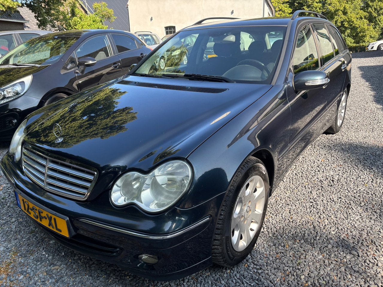 Mercedes-Benz C-klasse Combi - 180 K. Elegance AUTOMAAT NIEUWSTAAT - AutoWereld.nl