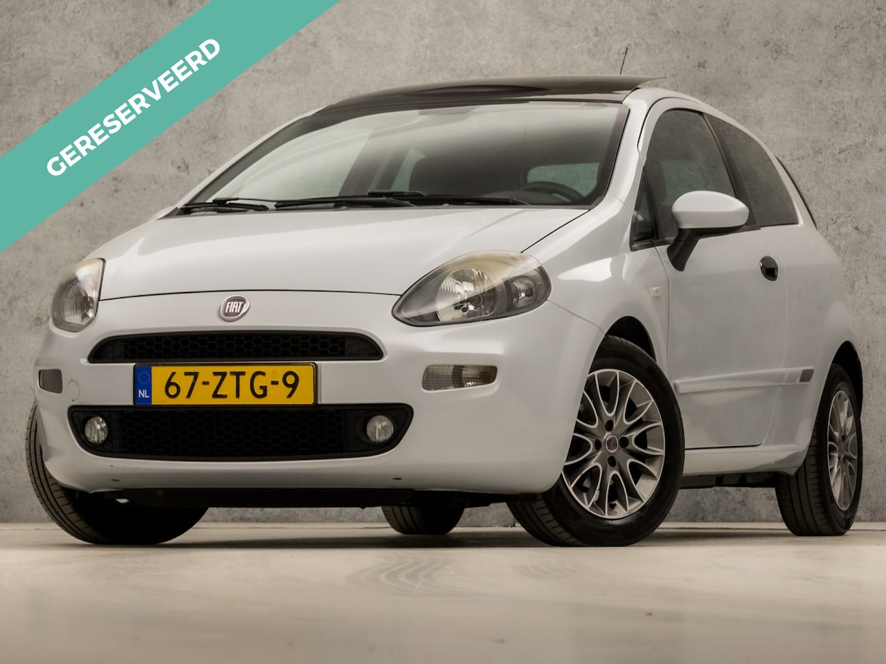 Fiat Punto Evo - 0.9 TwinAir Sport (PANORAMADAK, CLIMATE, GETINT GLAS, SPORTSTOELEN, ARMSTEUN, CRUISE, NIEU - AutoWereld.nl