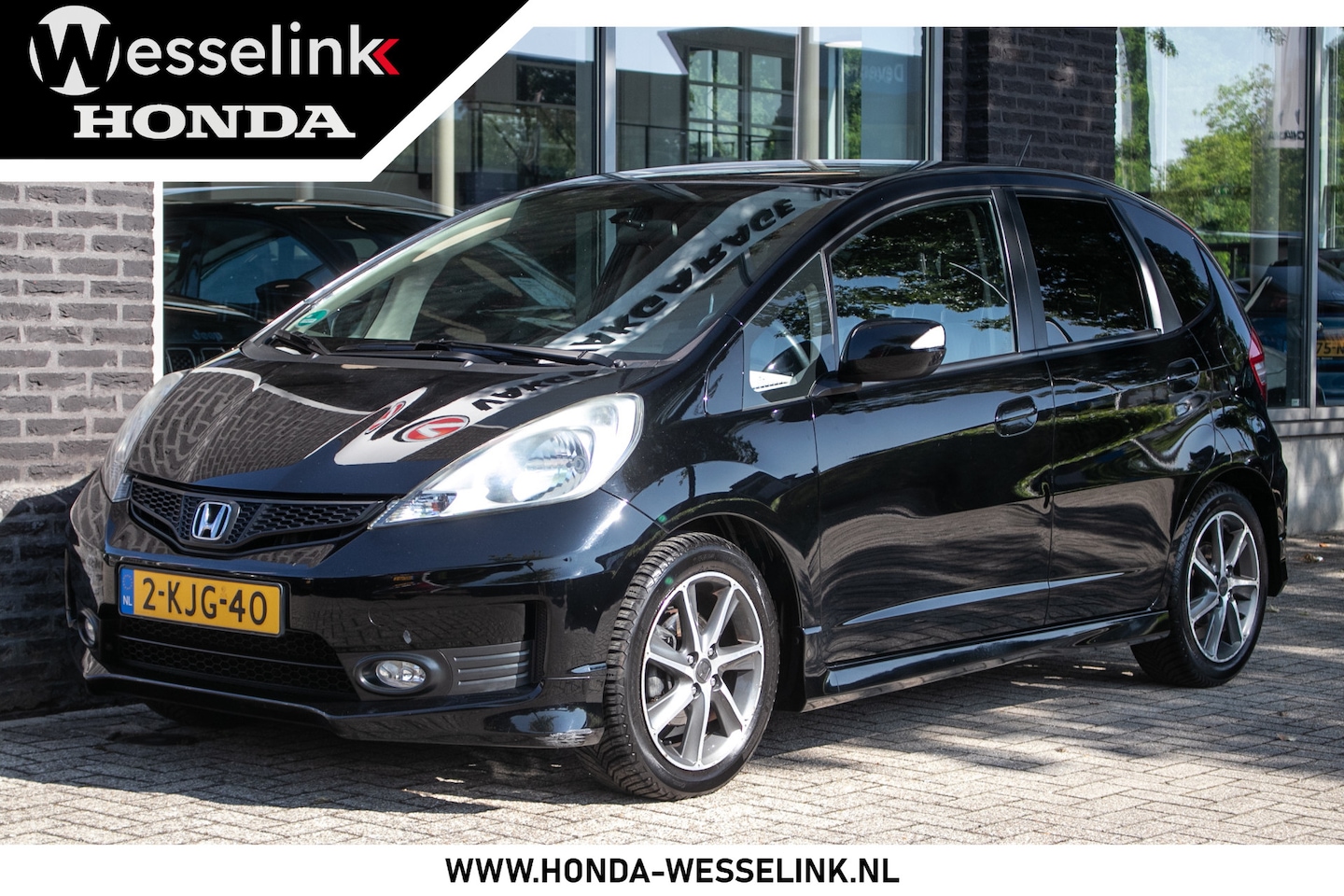 Honda Jazz - 1.4 Si - All-in rijklrprs | climatronic - AutoWereld.nl