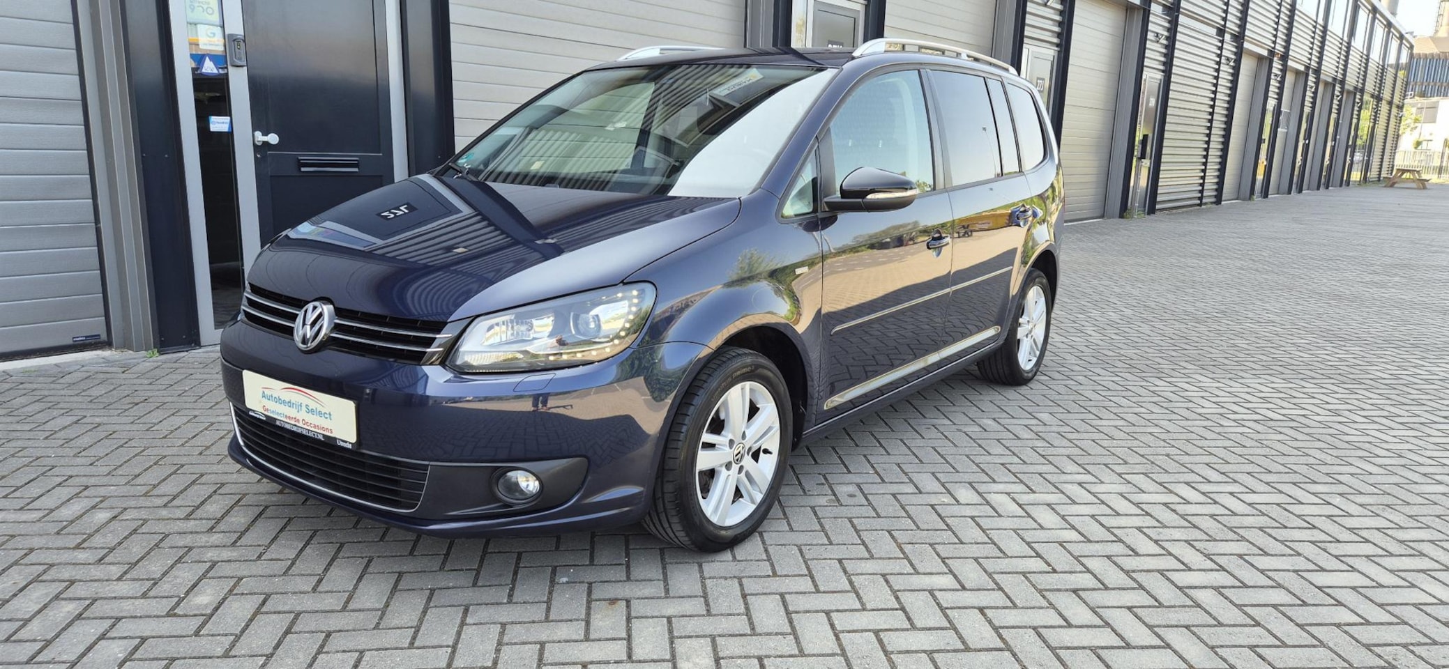 Volkswagen Touran - 1.4 TSI Match 7p. Airco/Cruise Control/Bluethoot/PDC achter/Stoelverwarming - AutoWereld.nl