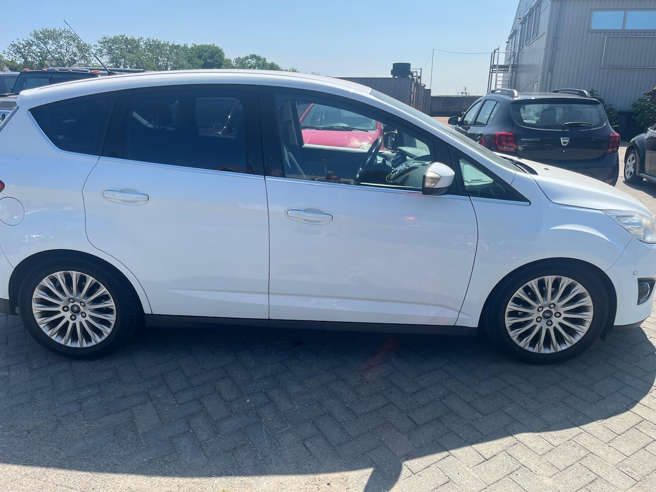 Ford C-Max - 1.0 Lease Titanium nieuwe motor met 80000 km - AutoWereld.nl